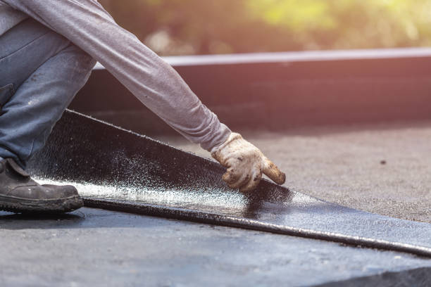 Professional Waterproofing technician working in Boon, MI